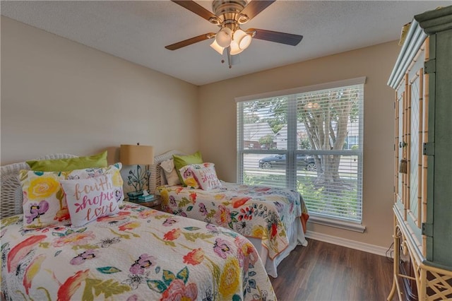 629 Spring Lake Dr W, Mobile, AL 36695 - bedroom with dark wood-style floors and ceiling fan
