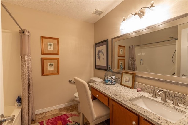 629 Spring Lake Dr W, Mobile, AL 36695 - full bath with vanity, shower / bath combo with shower curtain, a textured ceiling, and tile patterned floors