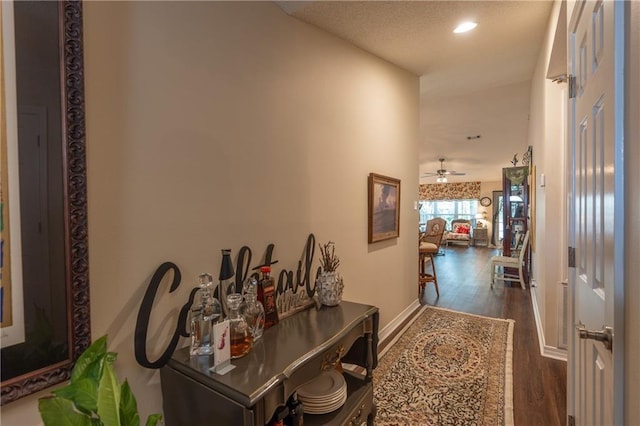 629 Spring Lake Dr W, Mobile, AL 36695 - hallway with dark wood-style flooring and recessed lighting