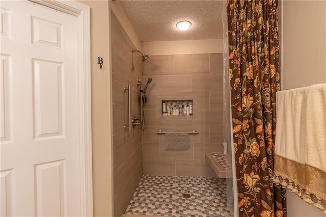 629 Spring Lake Dr W, Mobile, AL 36695 - full bath with a textured ceiling and tiled shower