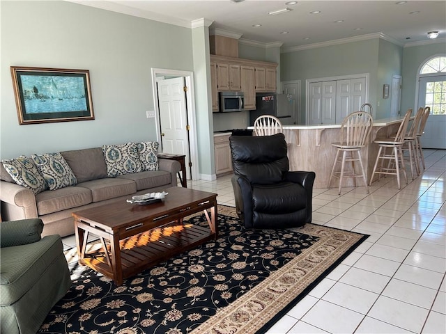 living room featuring crown molding and light tile patterned floors