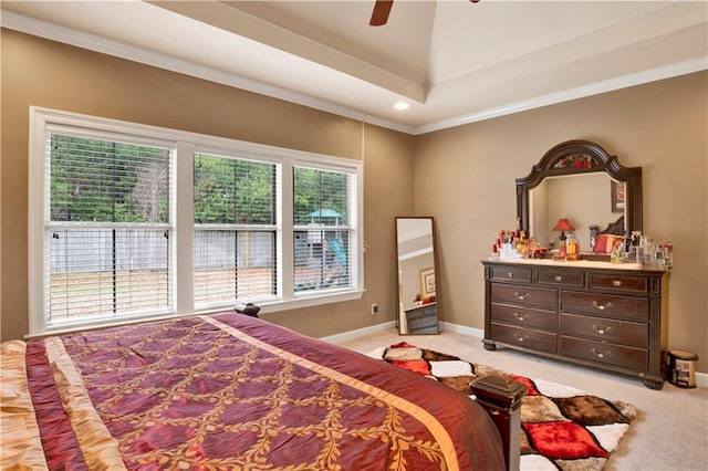 bedroom with crown molding, light colored carpet, and ceiling fan