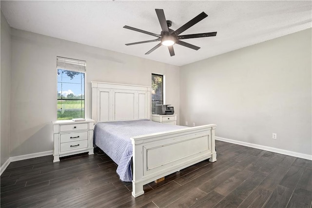 8500 Cindy Lou Dr, Theodore, AL 36582 - bedroom featuring dark wood-type flooring, multiple windows, and a ceiling fan