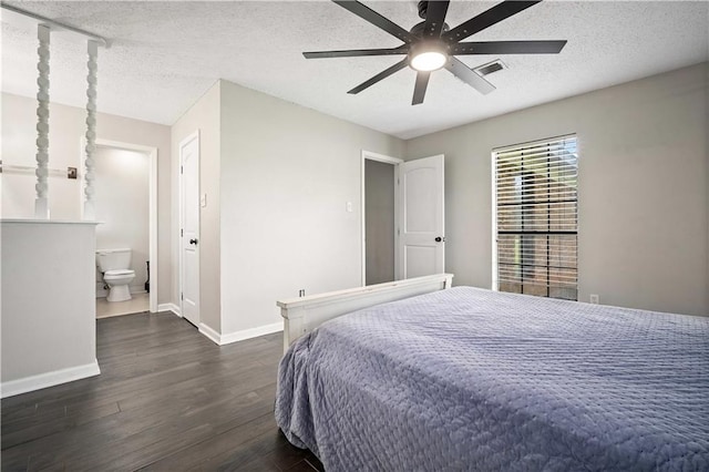 8500 Cindy Lou Dr, Theodore, AL 36582 - bedroom with dark wood finished floors, ensuite bath, a textured ceiling, and ceiling fan