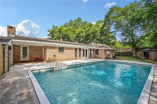 8500 Cindy Lou Dr, Theodore, AL 36582 - outdoor pool with a patio area