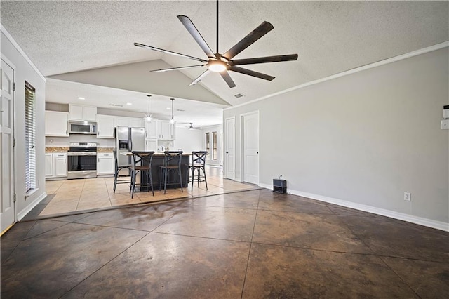 8500 Cindy Lou Dr, Theodore, AL 36582 - dining area featuring ceiling fan, a textured ceiling, vaulted ceiling, concrete floors, and crown molding