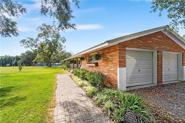 view of home's exterior featuring a yard