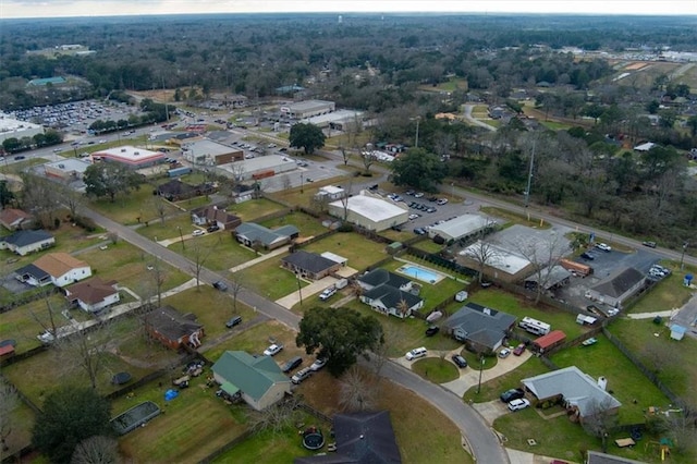 birds eye view of property with a residential view