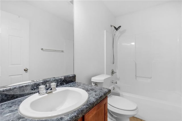 full bathroom with toilet, bathtub / shower combination, and vanity