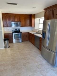 kitchen featuring appliances with stainless steel finishes