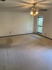 unfurnished room with ceiling fan