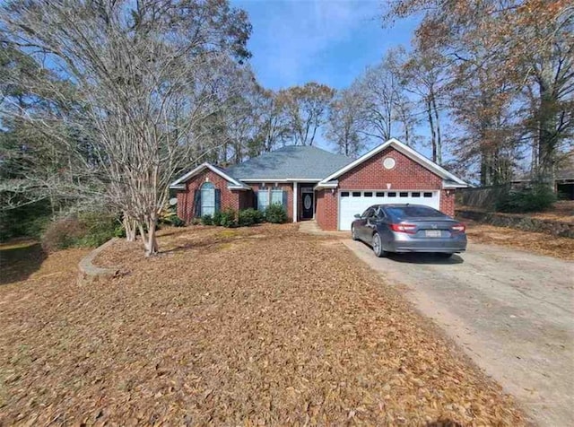 single story home with a garage