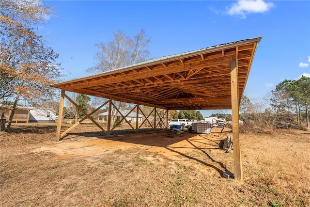 view of parking featuring a carport