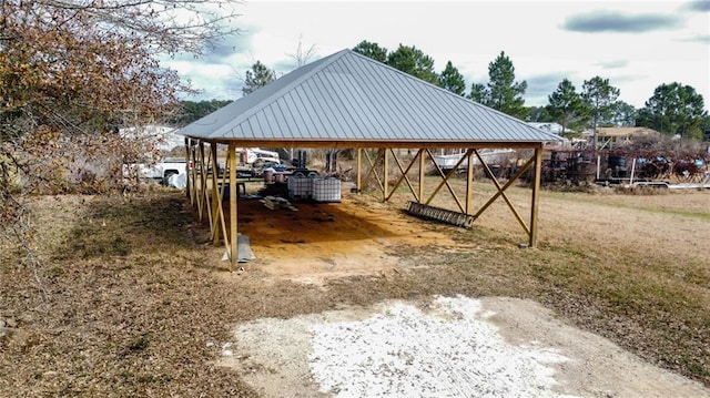 exterior space with a carport