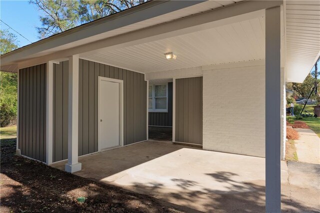 exterior space featuring an attached carport