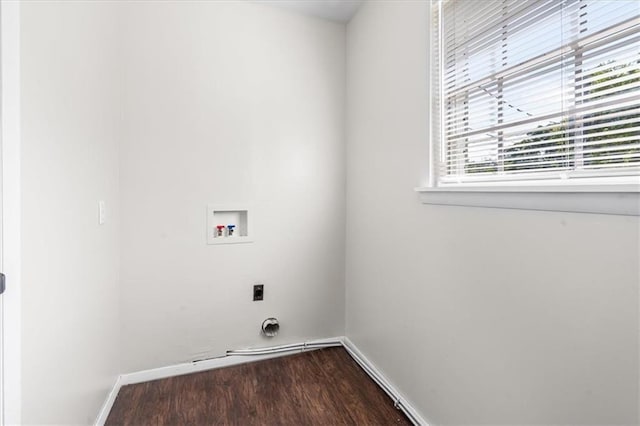 laundry area with baseboards, laundry area, washer hookup, and dark wood-style flooring