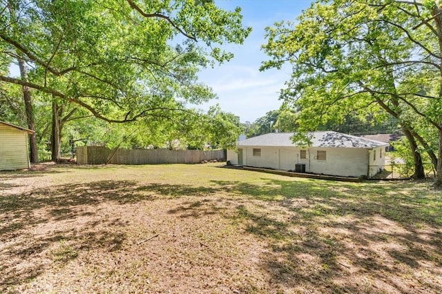 view of yard featuring fence