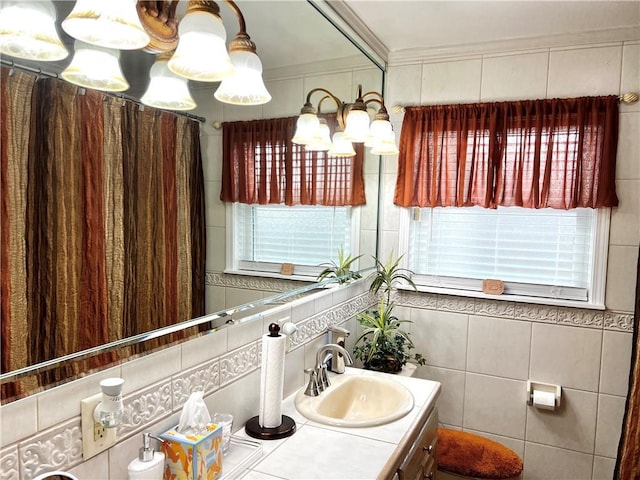 bathroom with plenty of natural light, tile walls, and vanity