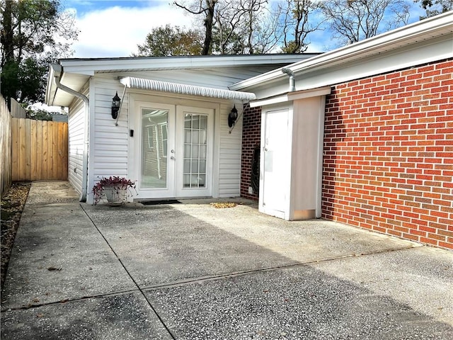 entrance to property with a patio area