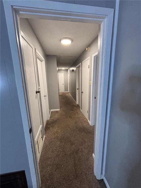 1205 Cadiz St, Mobile, AL 36693 - hallway featuring visible vents, attic access, baseboards, and carpet flooring