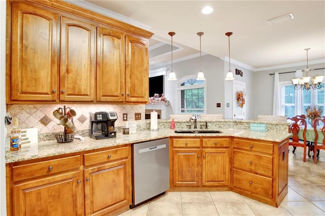 kitchen with sink, kitchen peninsula, an inviting chandelier, stainless steel dishwasher, and hanging light fixtures