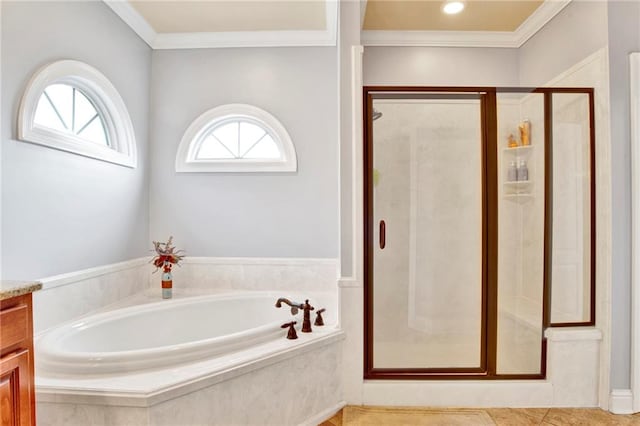 bathroom featuring tile patterned flooring, vanity, plus walk in shower, and crown molding