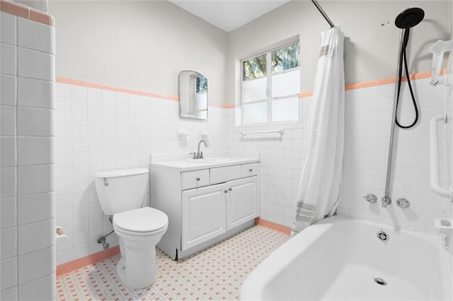 full bathroom with tile patterned floors, vanity, shower / bath combination with curtain, and tile walls