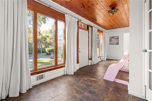 doorway featuring wooden ceiling