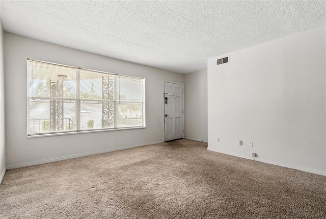 interior space with a textured ceiling