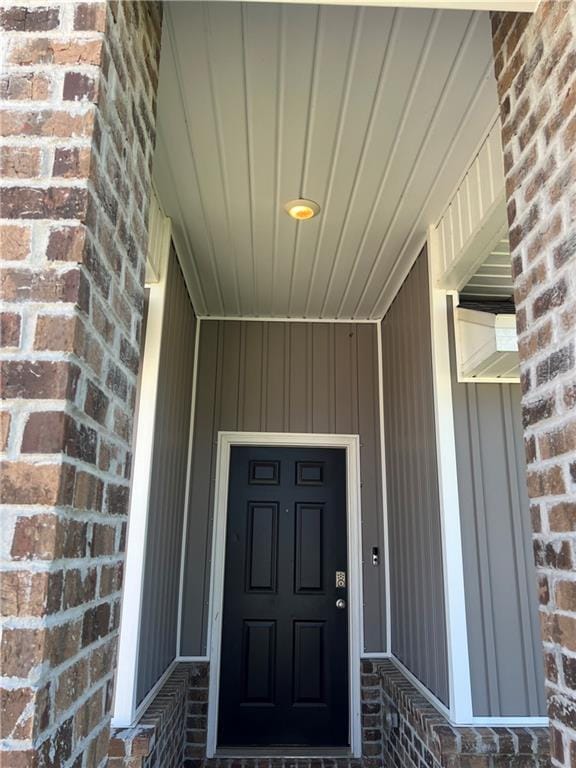6157 Stream Bank Dr, Mobile, AL 36582 - entrance to property featuring brick siding and board and batten siding