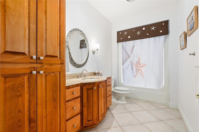 full bathroom featuring toilet, washtub / shower combination, vanity, tile patterned flooring, and baseboards