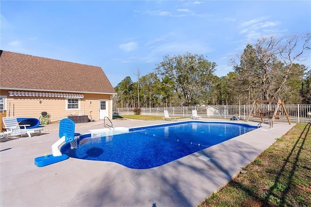 view of pool with a patio area, fence, and a fenced in pool