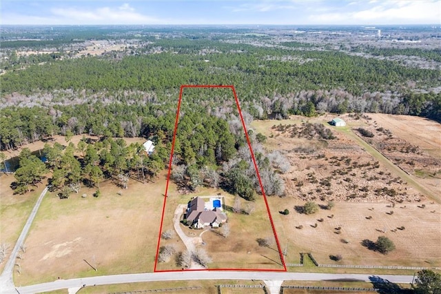 aerial view featuring a forest view