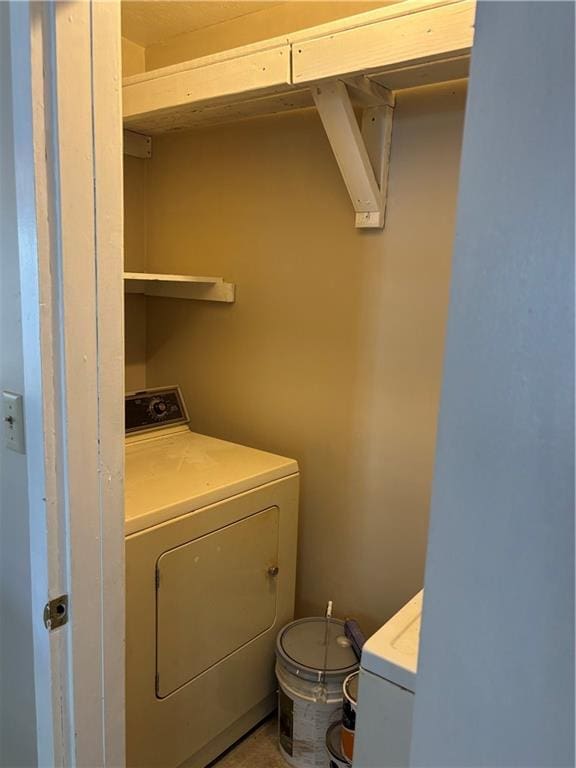 laundry room featuring washer / dryer