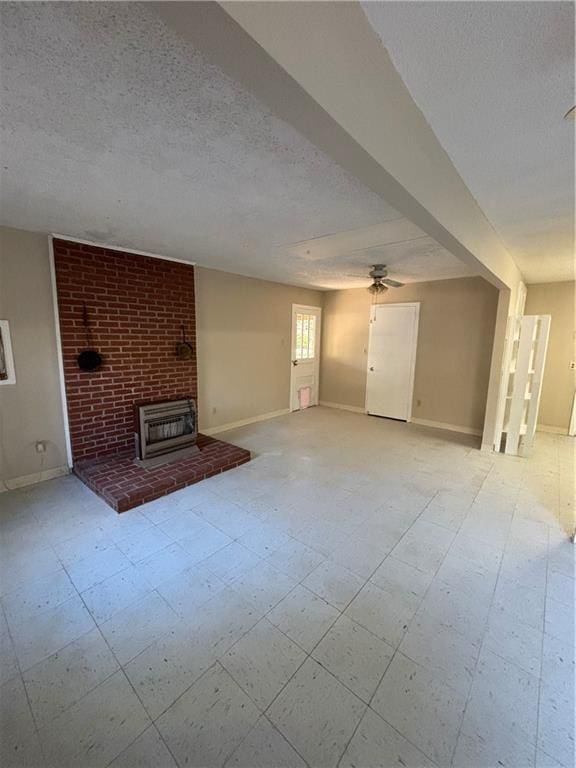 unfurnished living room with a textured ceiling and ceiling fan