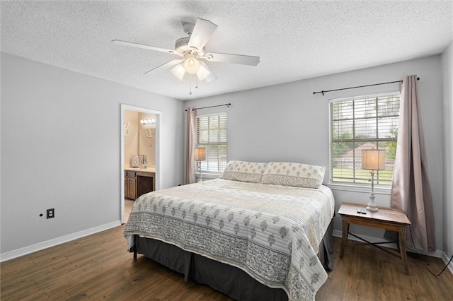 3660 Ching Dairy Rd, Mobile, AL 36618 - bedroom featuring wood finished floors, a textured ceiling, multiple windows, and baseboards