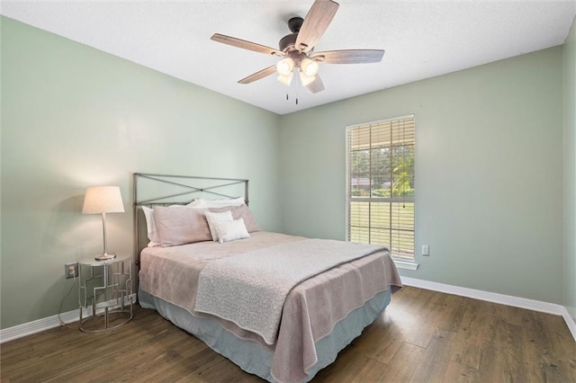 3660 Ching Dairy Rd, Mobile, AL 36618 - bedroom with wood finished floors, baseboards, and a ceiling fan