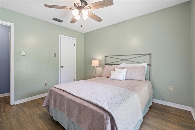 3660 Ching Dairy Rd, Mobile, AL 36618 - bedroom featuring wood finished floors, baseboards, and ceiling fan