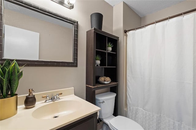 3660 Ching Dairy Rd, Mobile, AL 36618 - bathroom featuring toilet, vanity, a textured ceiling, and a shower with curtain