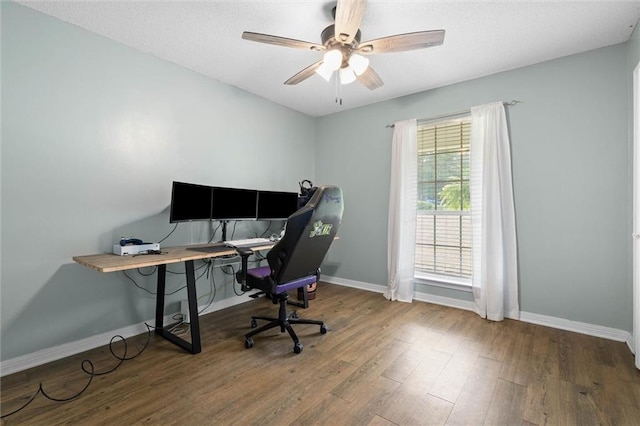 3660 Ching Dairy Rd, Mobile, AL 36618 - office area featuring baseboards, wood finished floors, and a ceiling fan