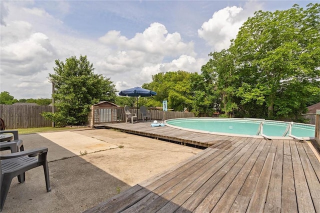 3660 Ching Dairy Rd, Mobile, AL 36618 - view of swimming pool with a wooden deck, a fenced backyard, and a patio area