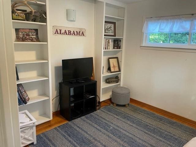 sitting room with dark hardwood / wood-style floors