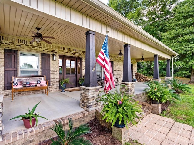 view of patio with ceiling fan and a porch