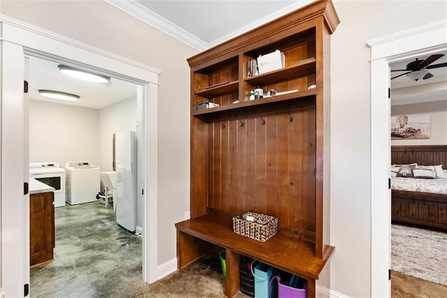 mudroom with separate washer and dryer, ceiling fan, and ornamental molding