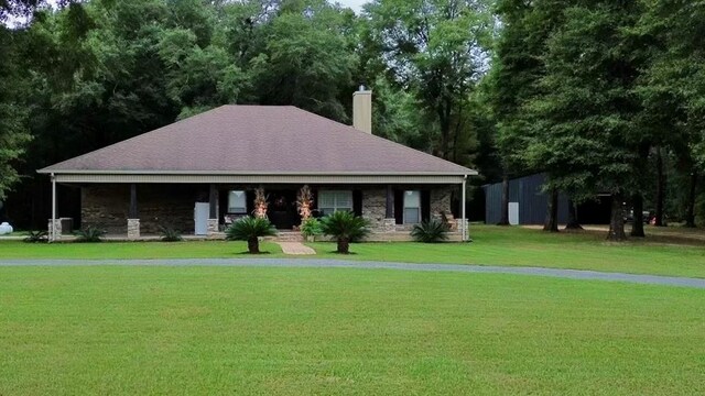 exterior space featuring a lawn