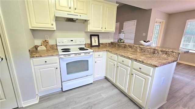 kitchen with light wood-style flooring, white electric range oven, a peninsula, and under cabinet range hood