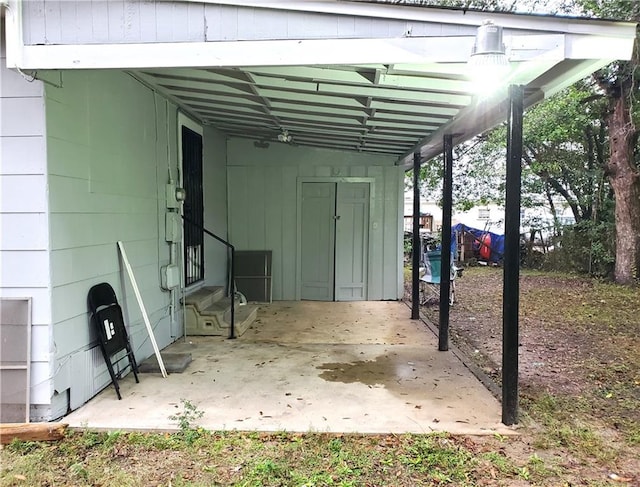 view of patio / terrace with a carport