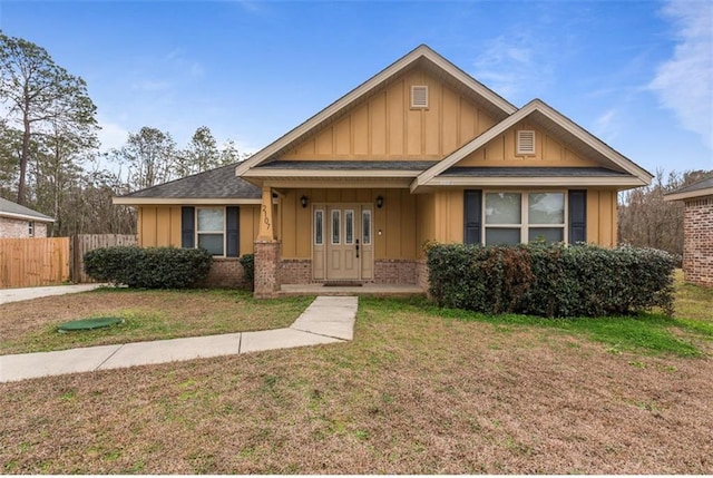 2107 Wolf Branch Dr N, Mobile, AL 36608 - bungalow-style home with board and batten siding, brick siding, and a shingled roof