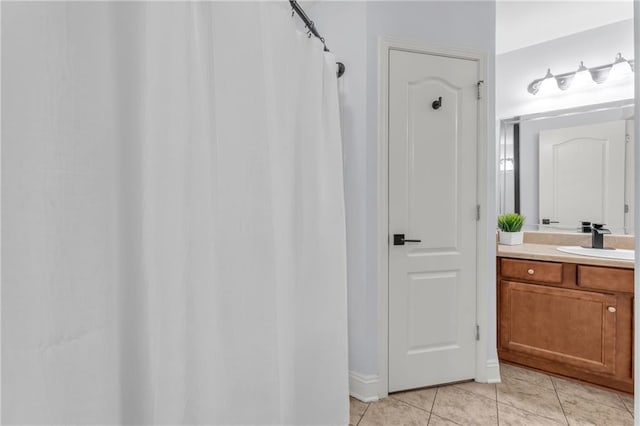 2107 Wolf Branch Dr N, Mobile, AL 36608 - full bath featuring vanity, tile patterned floors, and curtained shower