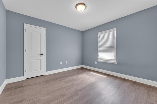 2107 Wolf Branch Dr N, Mobile, AL 36608 - unfurnished room with wood finished floors and baseboards